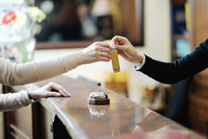 Hotel key is handed over to guest